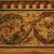 Mosaico con bordura a girali di acanto e animali